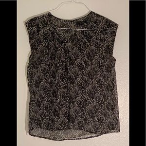 Black and white floral blouse with small bow